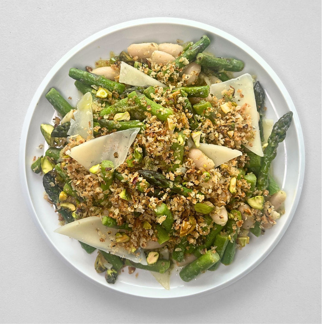 White Bean and Asparagus Salad With Tarragon Dressing and Pistachio Crunch