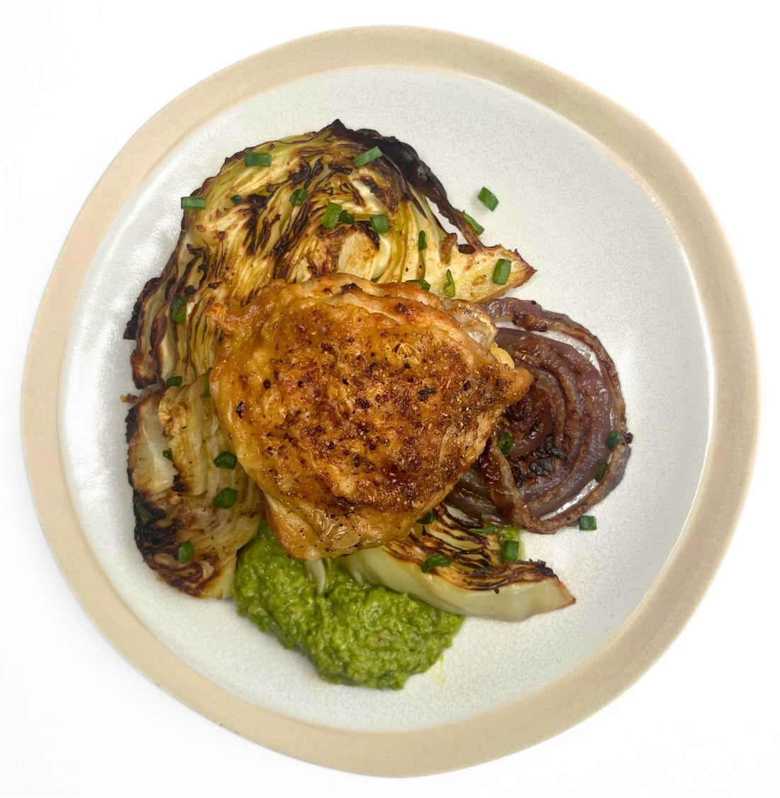 Sheet-Pan Chicken Thighs With Charred Cabbage and Punchy Green Sauce